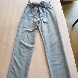 Slim trousers with bow tie